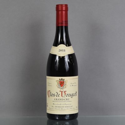 a bottle of wine that is sitting on a table