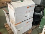 two boxes on a pallet in a warehouse