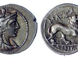a close up of a coin with a horse on it