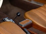 a close up of a car ' s dashboard and steering wheel