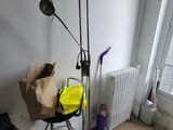 a lamp that is on a stand in a room