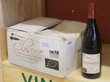 a bottle of wine and a box of wine on a shelf