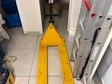 a fork lift in the middle of a room