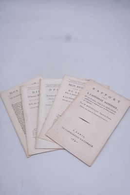 four pages of a book are stacked on top of each other