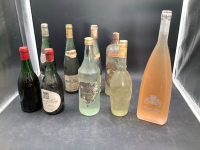 bottles of alcohol are lined up in a row on a counter