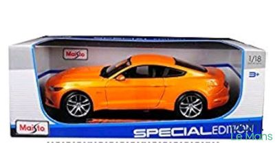 the toy car is in the box on the white background