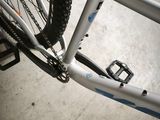 a close up of a bicycle with a chain attached to it