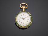 an antique gold and enamel pocket watch with green enamel dial