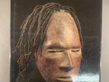 the cover of a book with a picture of a man ' s face on it