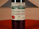 a bottle of wine that is sitting on a table