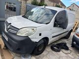 a van that has been vandalized with a tarp on it