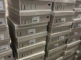 boxes stacked on top of each other in a warehouse
