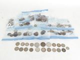 a lot of coins in the bag on the table