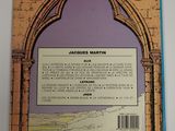 the front cover of a book with a picture of an arch in the background