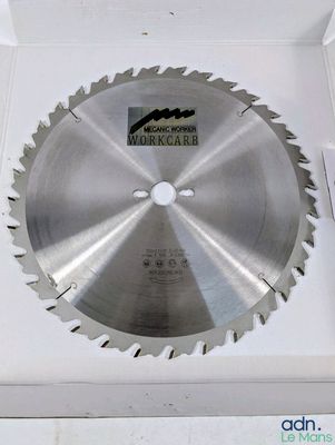 a circular saw blade in a box on a table
