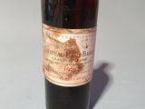 a bottle of wine that is sitting on a table