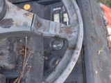 a close up of a steering wheel on a tractor