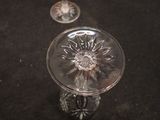 two wine glasses that are sitting on a table