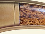 a close up of a wooden object on a table