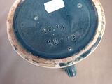 a close up of a blue and white vase with numbers on it