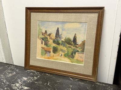 tableau représentant un paysage avec des bâtiments et des arbres, dans un cadre en bois