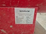 une image représentant une boîte rouge sur laquelle est apposée une étiquette portant l'inscription « sovelor »