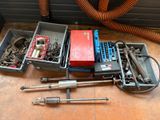 a lot of tools that are sitting on the floor