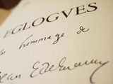 a close up of a book with writing on it
