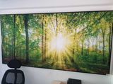 a picture of a painting on the wall of a home office