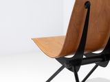 an image of a chair with a wooden seat and black legs