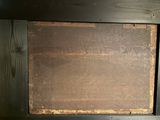 a picture of a piece of wood on a shelf