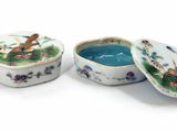 pair of chinese porcelain bowls with lids with animals and flowers on them