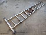 a close up of a metal ladder laying on the ground