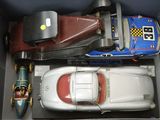 a toy car and a toy car in a box