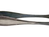 a pair of tonges that are on a white surface