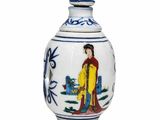 un vase blanc et bleu orné d'une peinture
