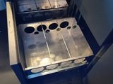 a machine that has a bunch of metal items in it