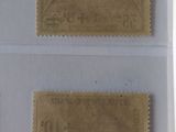 two stamps on a piece of paper with the same stamp on them