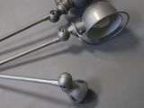 three lamps that are sitting on a table