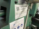 a machine that is working on a piece of paper