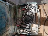 a box full of tools sitting on top of a table