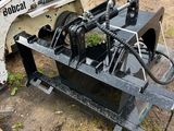 a small machine that is sitting in the dirt