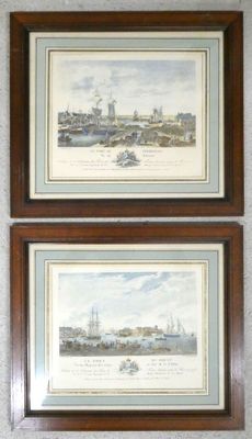 two framed pictures of ships on a wall in a room