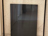 a picture of a mirror in the corner of a room