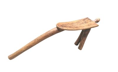 a small wooden spoon with a wooden handle on a white background