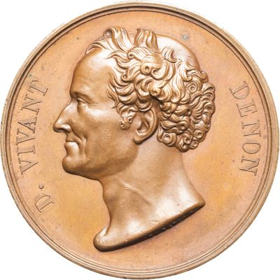 une image d'une pièce d'or avec le profil d'un homme