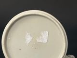 a close up of a cup on a table