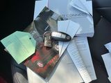 a bunch of papers on the back seat of a car