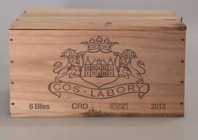 a wooden box with a picture of a castle on it