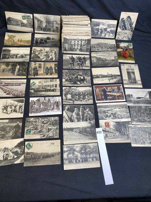 several old postcards of people and animals on a table